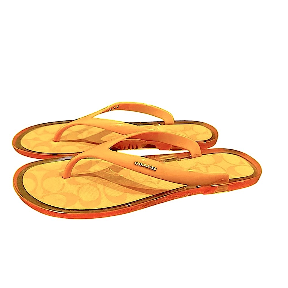 COACH “Nisa” yellow jelly sandals rubber flip flops gold toned logo size 8